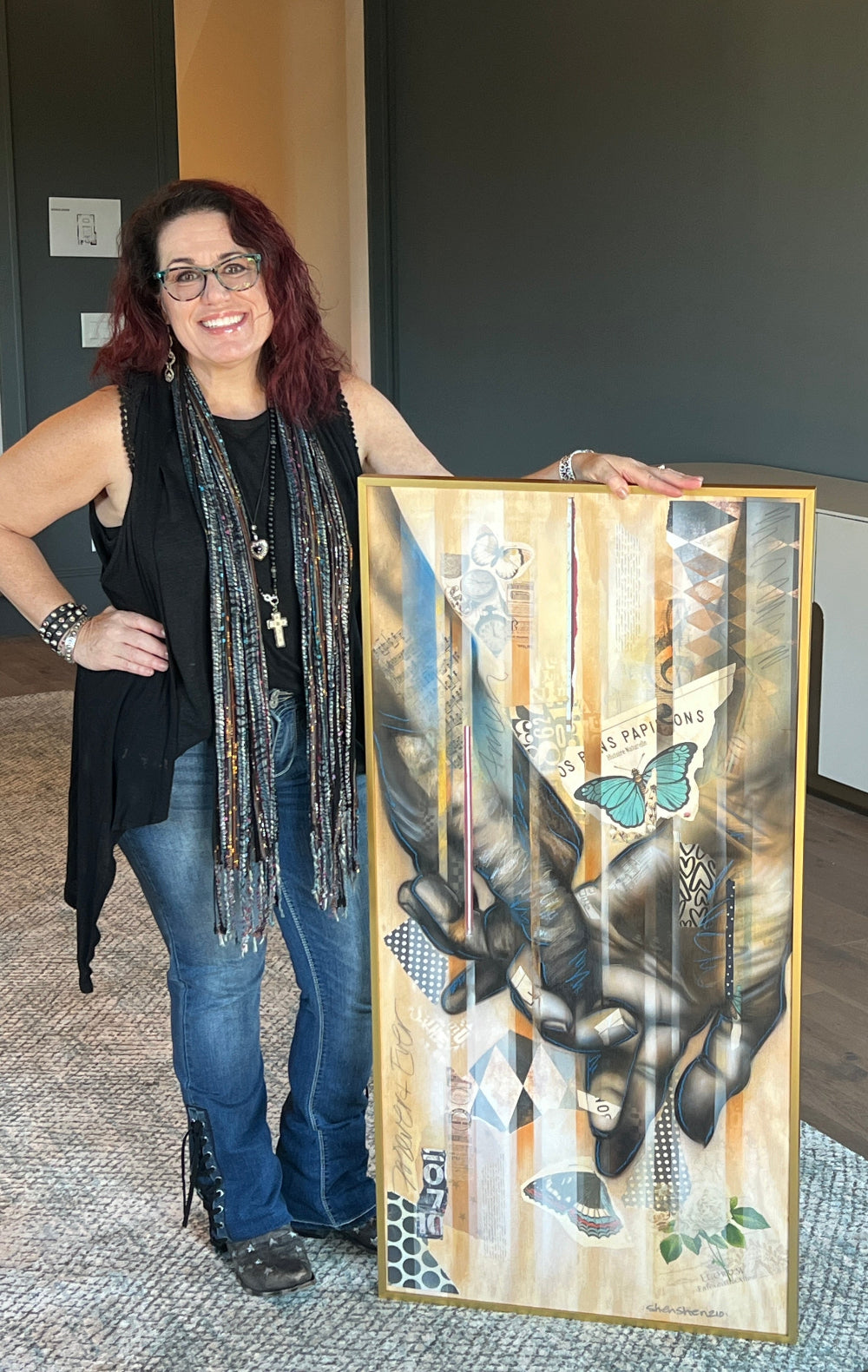 ShenShen with her mixed media painting with sheet music, butterflies, and vintage textures.