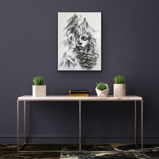 Resilient love displayed on a blue gallery wall above a modern white table.