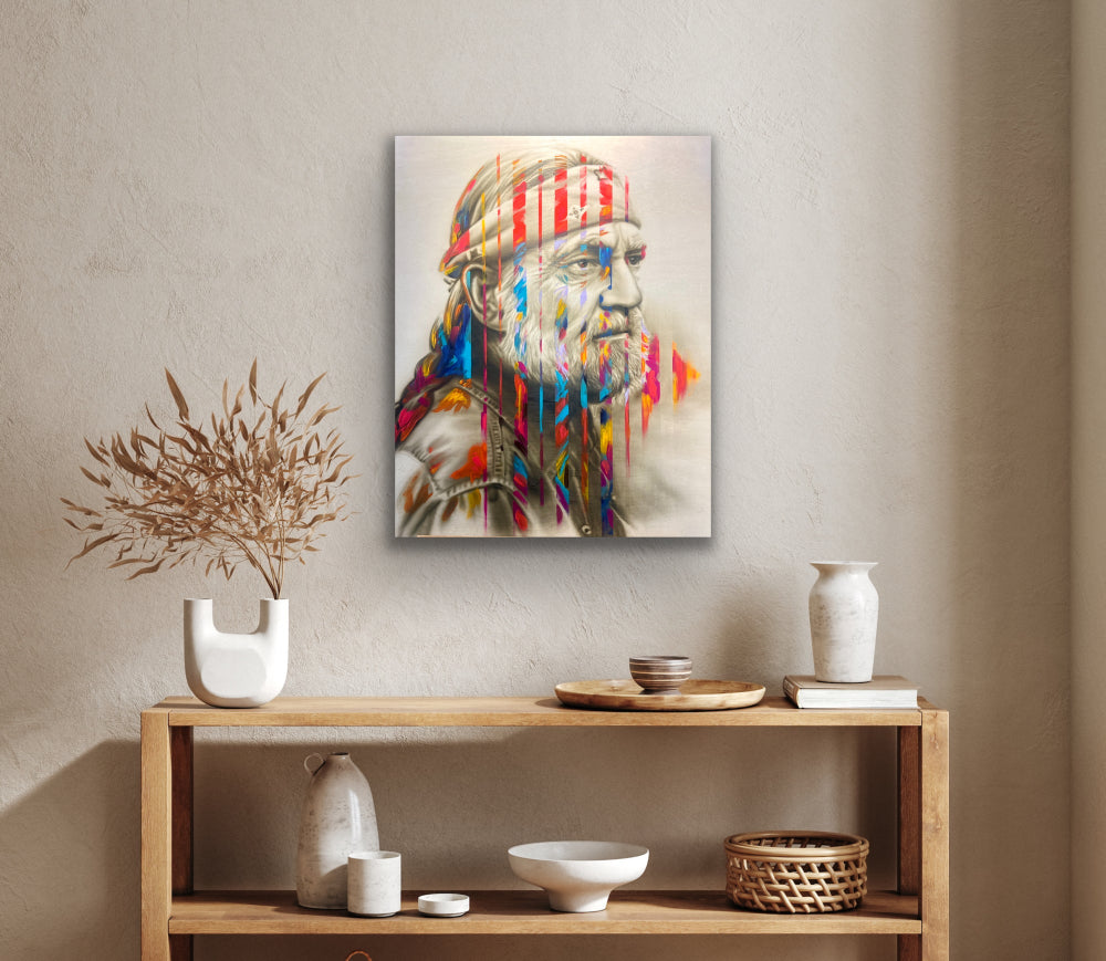 Colorful portrait of a man with a headband on a wall above a wooden shelf with decorative items.