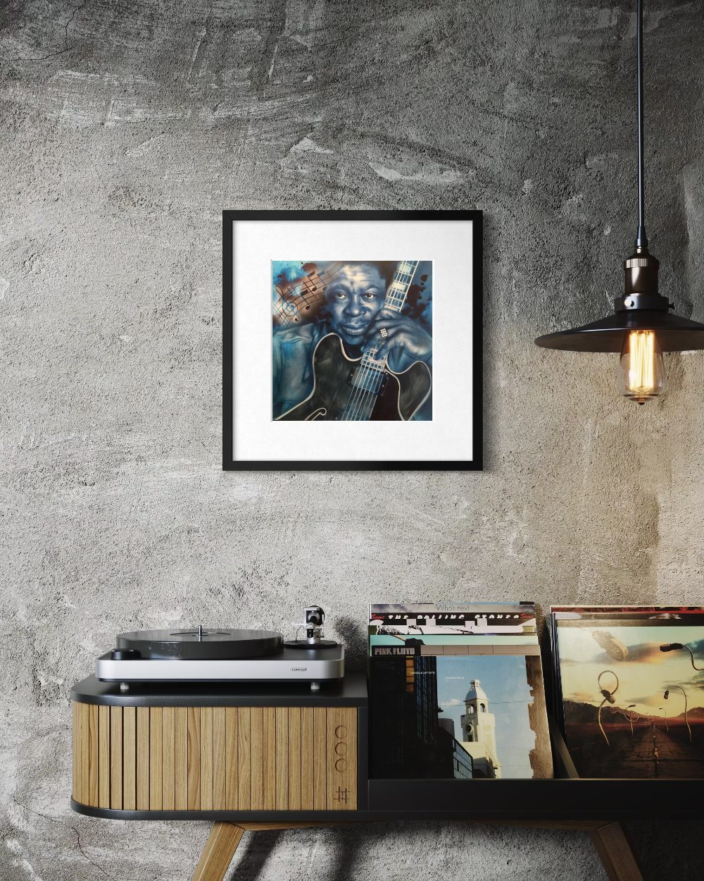 Framed artwork of a person with a guitar on a wall above a record player and records. BB King Blues fine art reproduction limited edition paper print by shenshen.