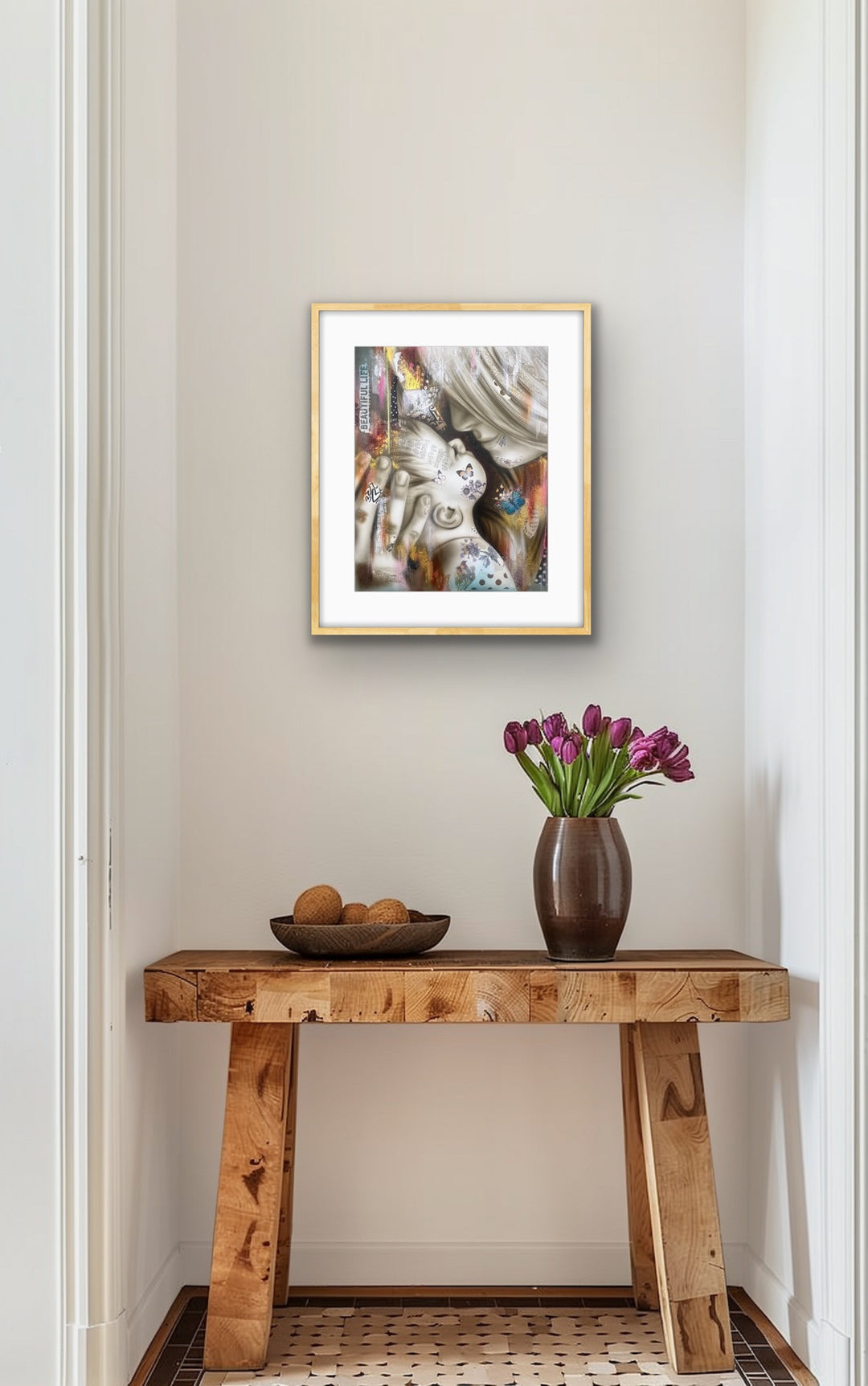 Beautiful Life art print framed in natural wood and displayed above a wooden table styled with boho décor elements.