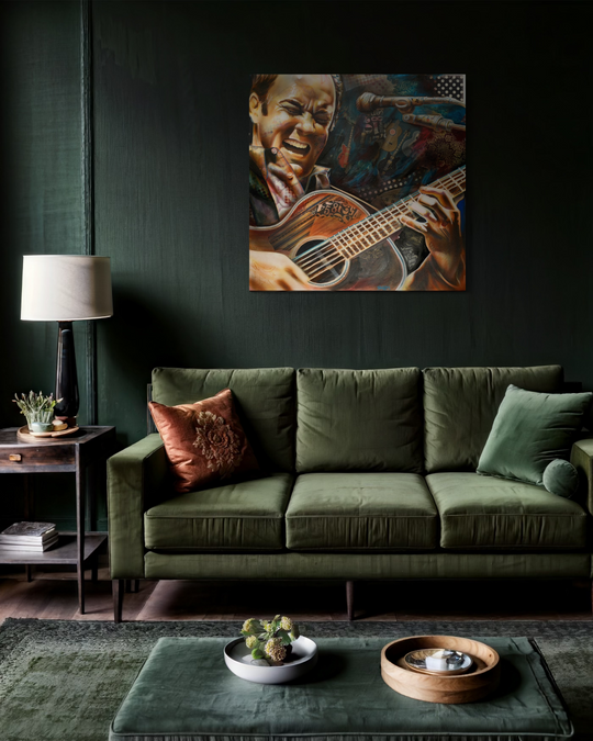 Living room with a green sofa, decorative pillows, and a painting of a person playing a guitar on the wall. Dave Matthews limited edition reproduction fine art print by ShenShen.