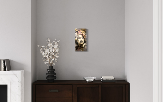 Wall art on a gray wall above a wooden console table with decorative items. canvas giclee reproduction of Iridescent Dolly Parton by ShenShen