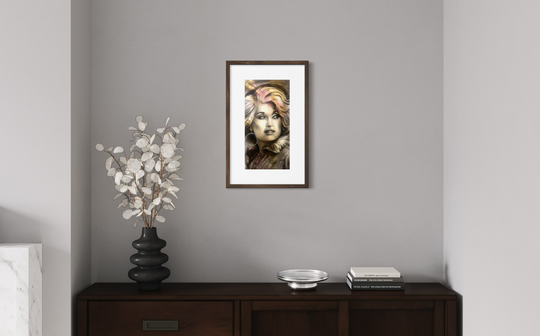 Framed artwork on a gray wall above a wooden console table with decorative items.