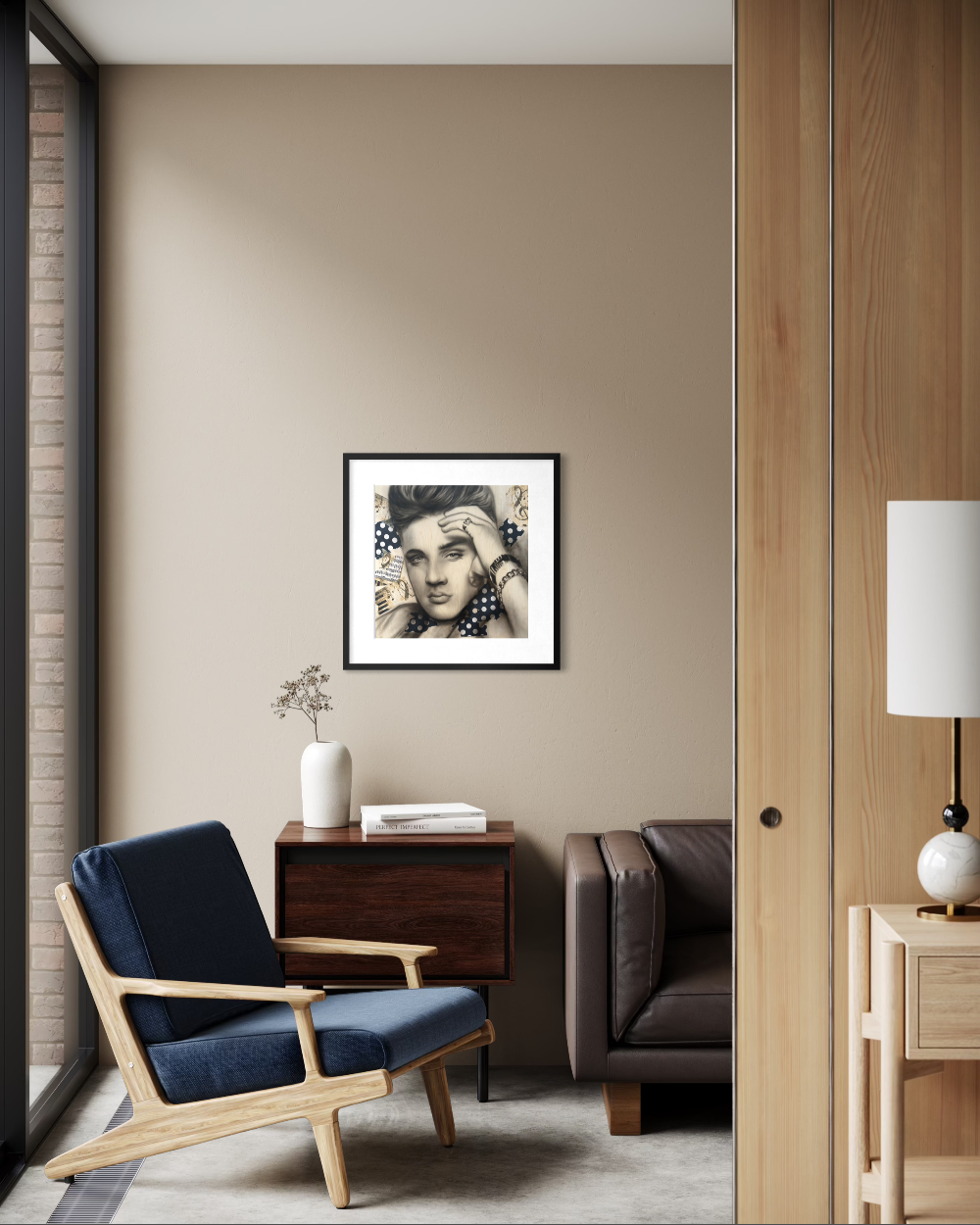 Modern living room with a blue armchair, brown sofa, and framed artwork on the wall. Elvis paper reproduction limited edition fine art print by shensen.