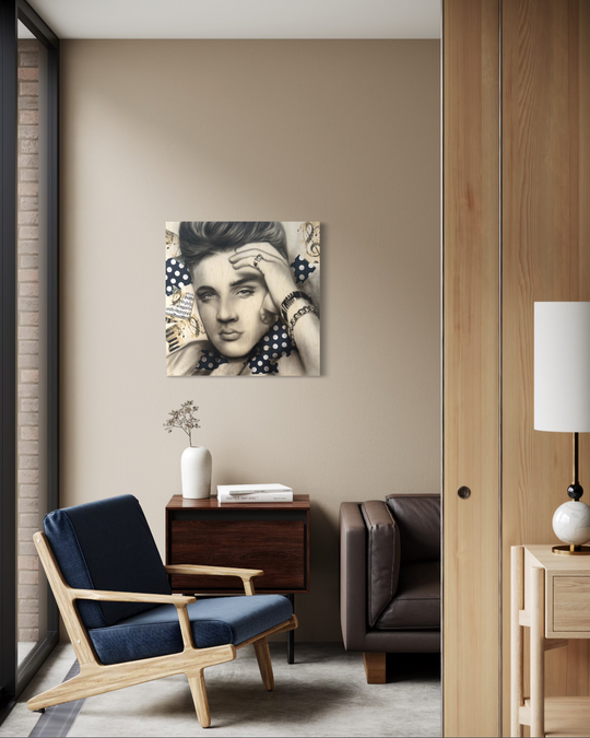 Modern living room with a blue armchair, brown sofa, and wall art of a famous person. Elvis paper reproduction limited edition fine art print by shensen.