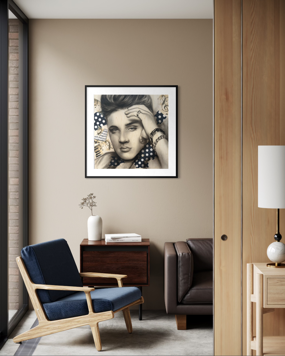 Modern living room with a framed portrait on the wall, blue armchair, and wooden side table. Elvis paper reproduction limited edition fine art print by shensen.
