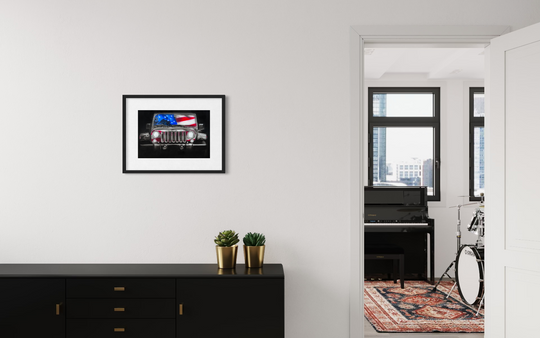 Modern interior with a framed picture of a car, black dresser, and open door leading to another room. fine art limited edition paper print reproduction by shenshen.