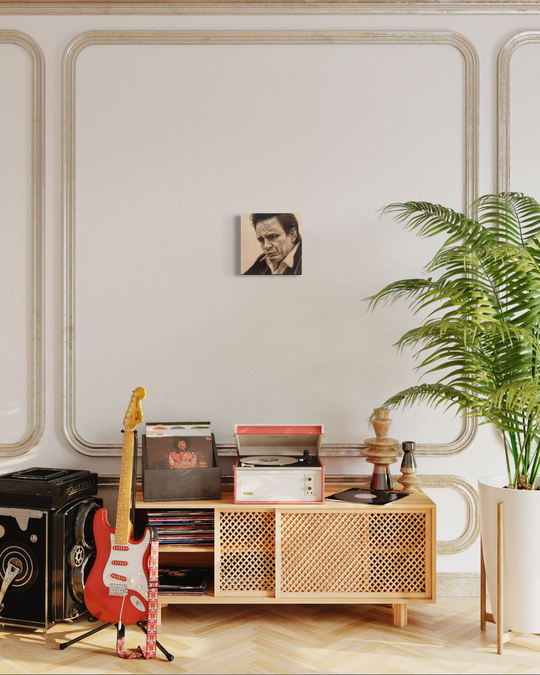 Living room with wooden cabinet, guitar, records, and plant. johnny cash giclee canvas reproduction limited edition by shenshen