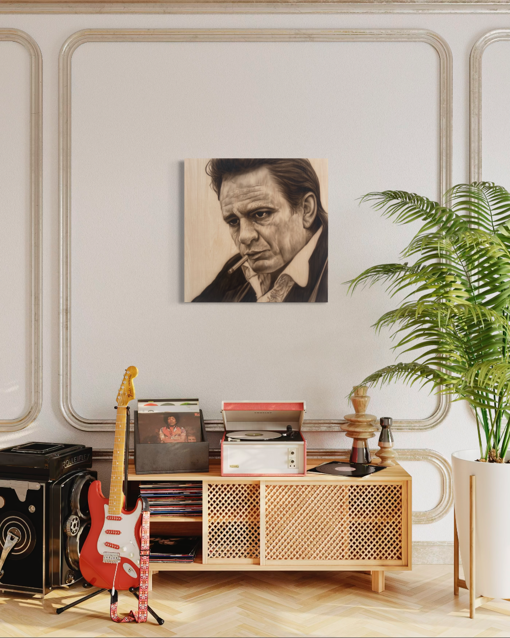 Living room with a portrait of a man on the wall, a guitar, and a record player. johnny cash giclee canvas reproduction limited edition by shenshen
