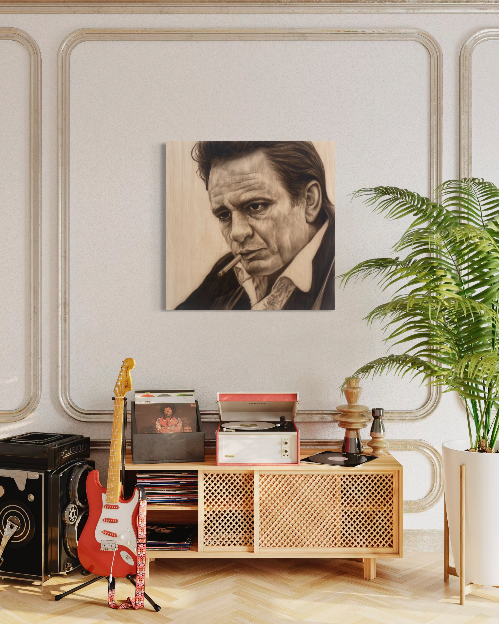 Living room with a portrait of a man on the wall, guitar, records, and a plant. johnny cash portrait fine art print limited edtion by shenshen