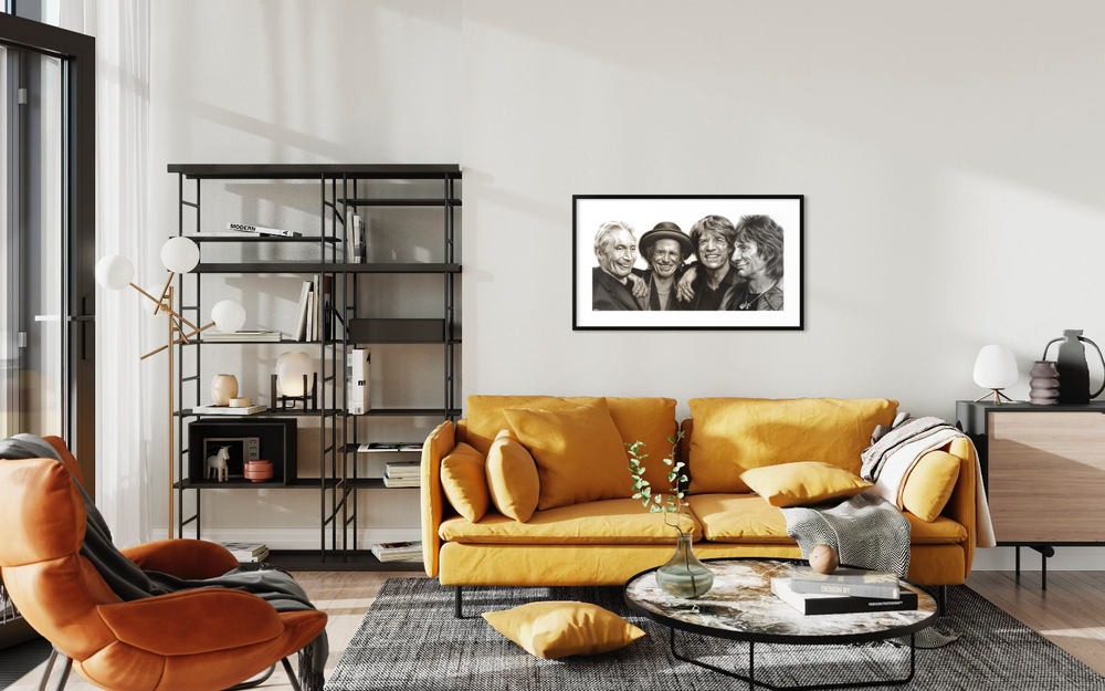 Modern living room with a yellow sofa, orange armchair, and decorative wall art.Rolling Stones by ShenShen limited reproduction paper fine art print.