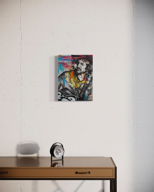 Abstract painting on a white wall above a wooden desk with a clock. Waylon Jennings limited edition reproduction fine art print by ShenShen.