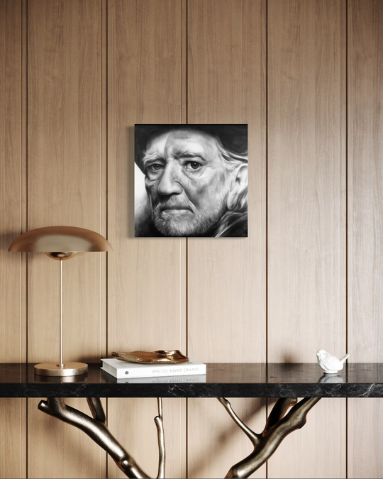 Black and white portrait on a wooden wall above a table with decorative items. willie nelson limited edition reproduction canvas giclee print by shenshen