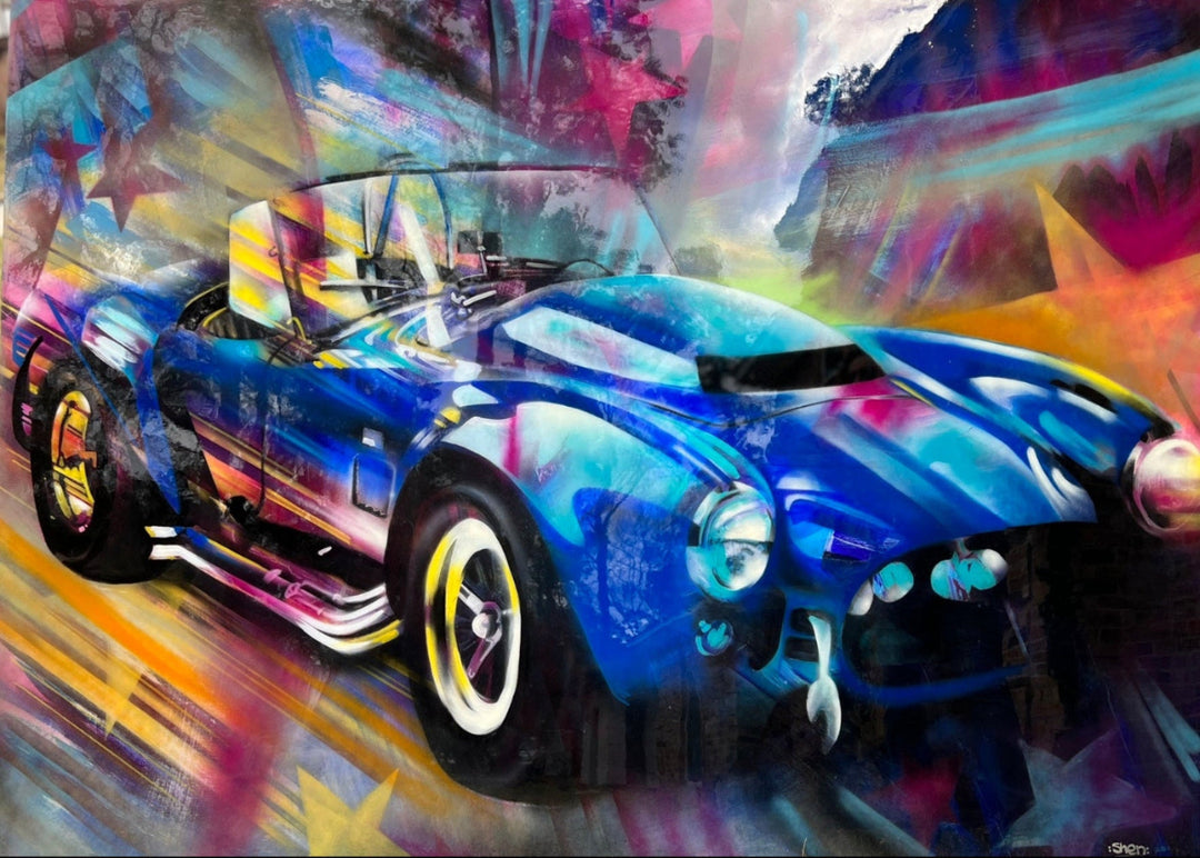 A vibrant mixed media painting on wood featuring a blue Shelby Cobra with a high-gloss resin finish.